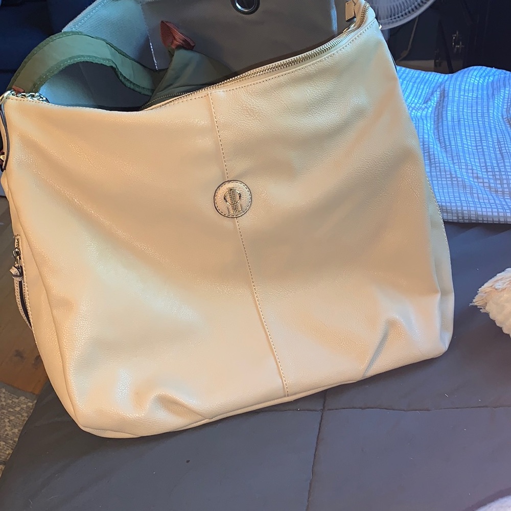 A cute fashionable purse pretty much brand new !